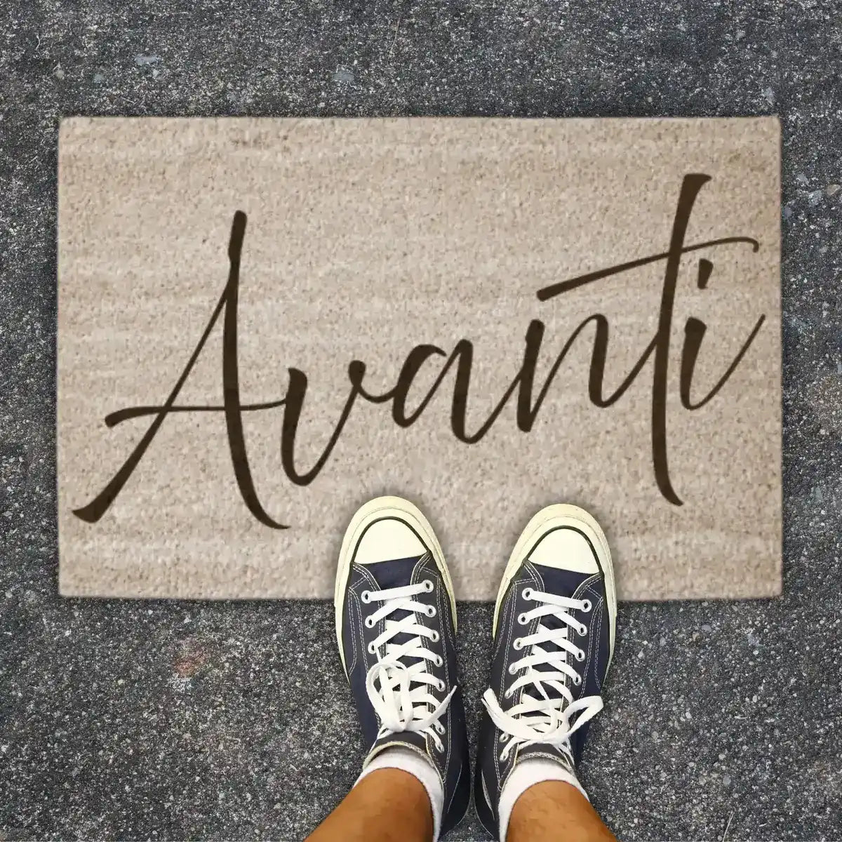 Doormat featuring the word “Avanti” (“come in”) in script lettering, welcoming guests with a touch of Italian heritage pride. A thoughtful housewarming gift.