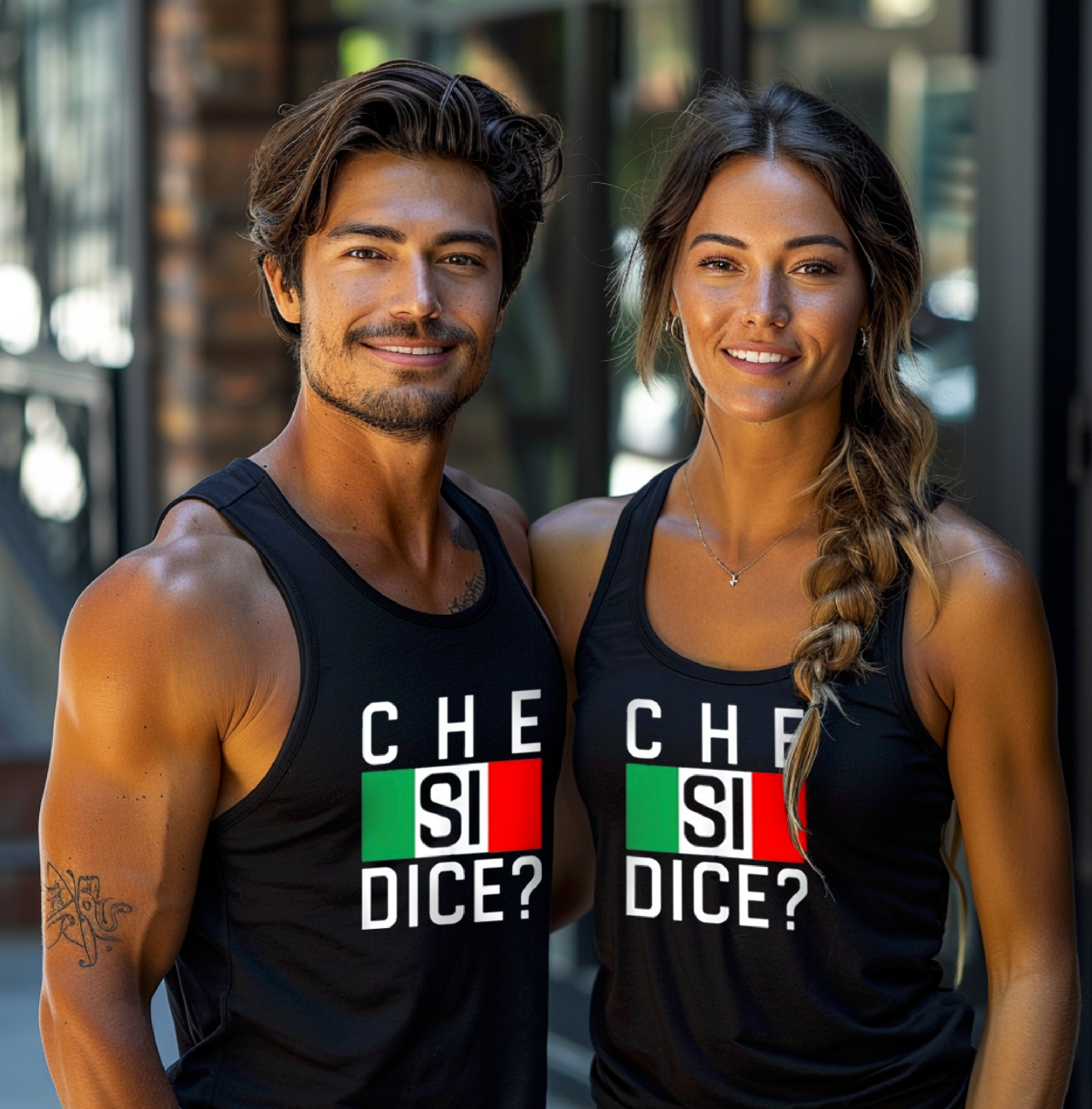 Couple wearing Che Si Dice? (What's Up) Tank tops in navy. Check out the Italian Sicilian Gifts tank top collection of heritage designs.