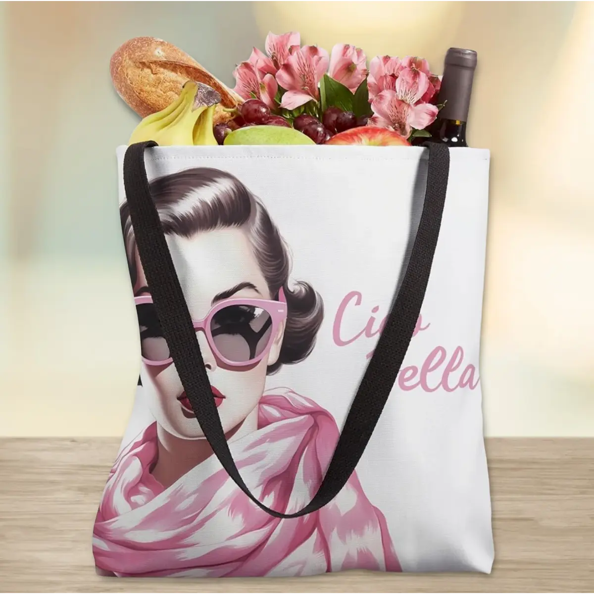 White tote bag with 'Ciao Bella' in pink script and retro vintage illustration of woman in pink sunglasses and pink scarf. Italian heritage gift, gift for her, reusable shopping bag, gym bag, beach bag, birthday gift, Christmas gift, and stylish everyday carry for Italian chic.