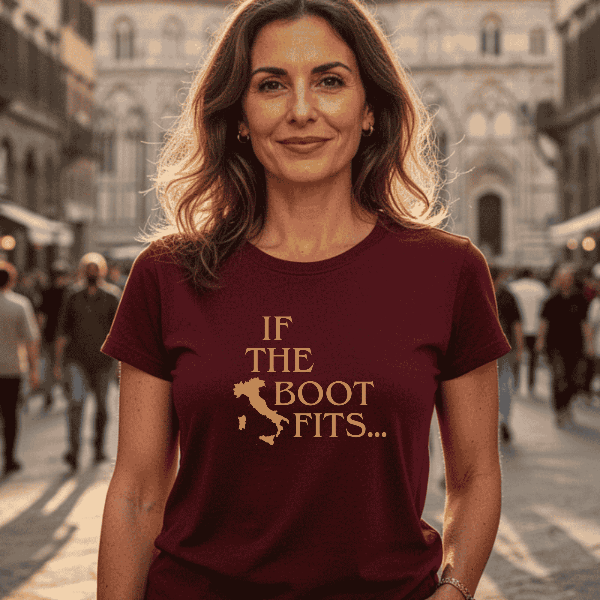 Woman wearing a maroon t-shirt with the clever phrase 'If the boot fits' text (with silhouette of Italy) - Italian heritage gift