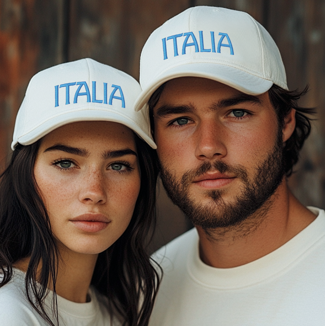 Couple wearing white baseball cap with ITALIA in blue embroidery. Italian heritage gift, Italy pride hat, Italian baseball cap, gift for Italian family, Italian American gift, Italy travel hat, Italian pride apparel.