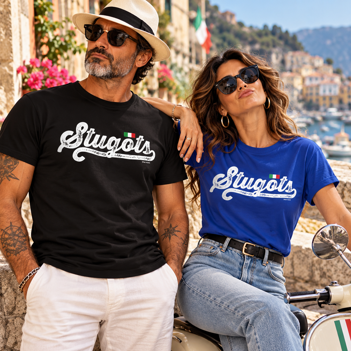 Edgy Italian couple wearing black and royal blue Stugots T-shirts in Italy. Funny sarcastic Italian slang shirts with attitude, perfect gifts for proud Italians, Sicilians, and Italian Americans.