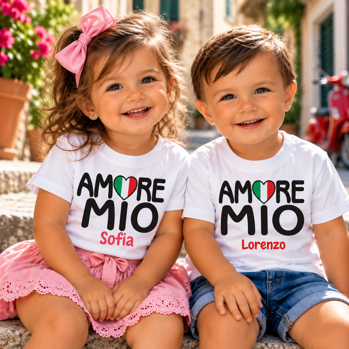 Adorable Italian boy and girl wearing personalized Amore Mio T-shirts with Italian flag hearts and names Sofia and Lorenzo. Cute Italian kids' gifts.