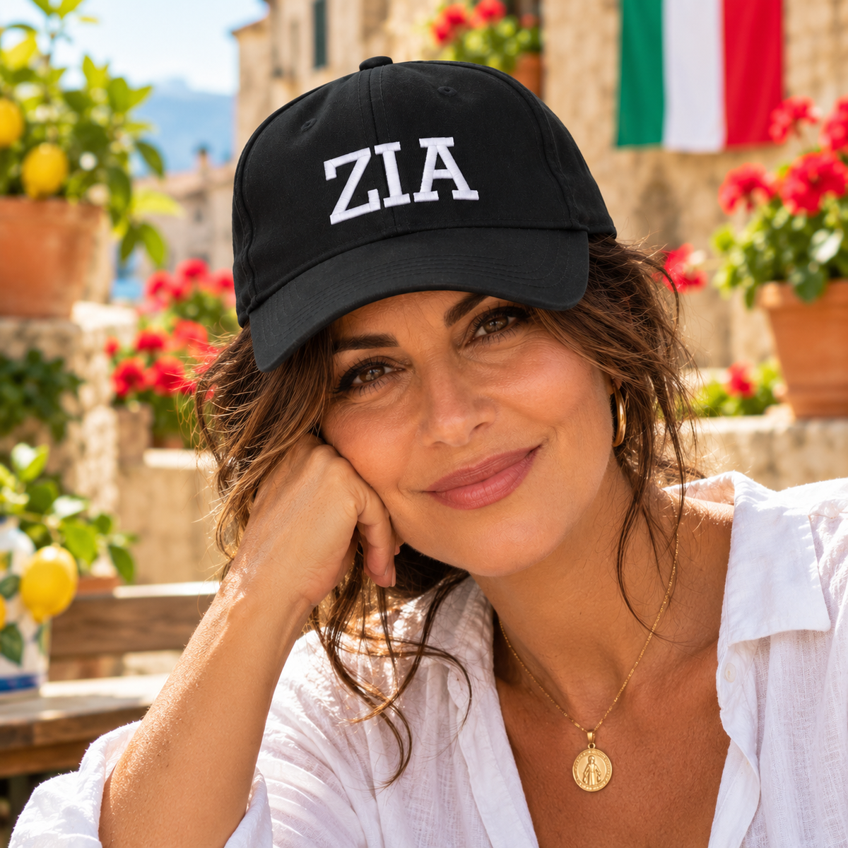 Italian aunt wearing black ZIA embroidered baseball cap. Stylish Italian heritage gift for Zia, birthdays, Mother's Day and Christmas.