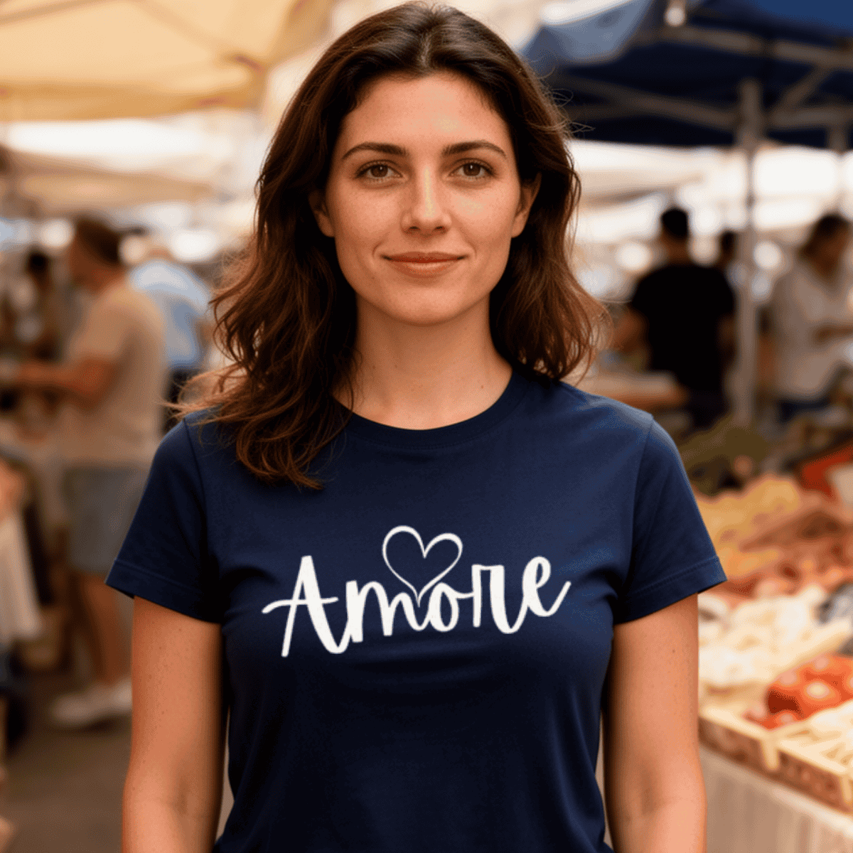 Woman wearing a navy blue t-shirt with 'Amore' printed on it - Italian and Sicilian heritage design