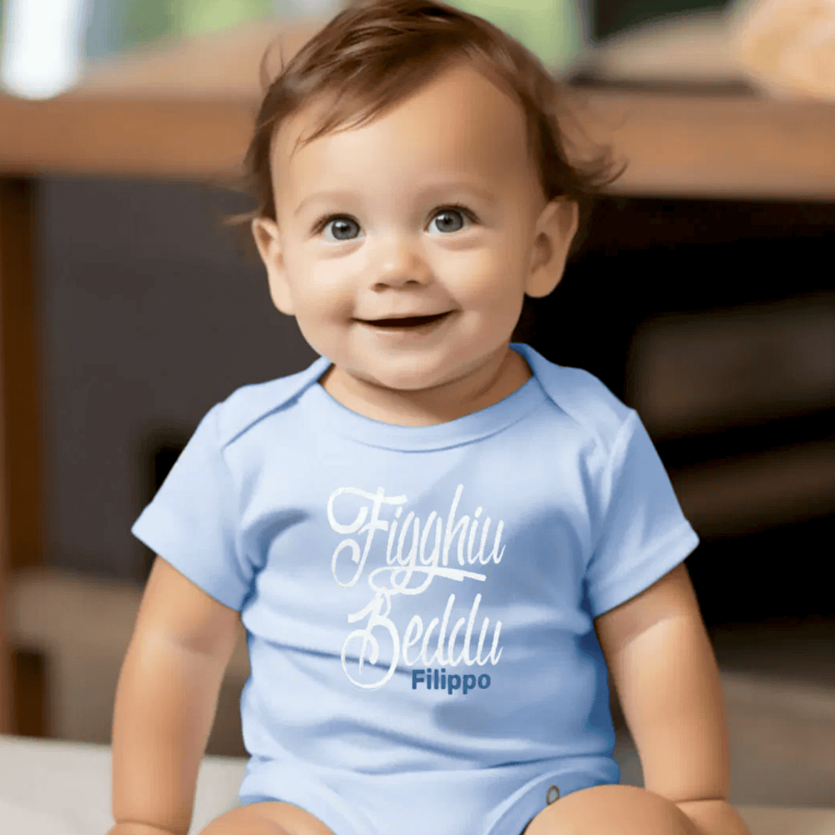 Baby wearing a light blue onesie with "Figghiu Beddu" Sicilian for "Handsome Son" - Sicily heritage baby gift