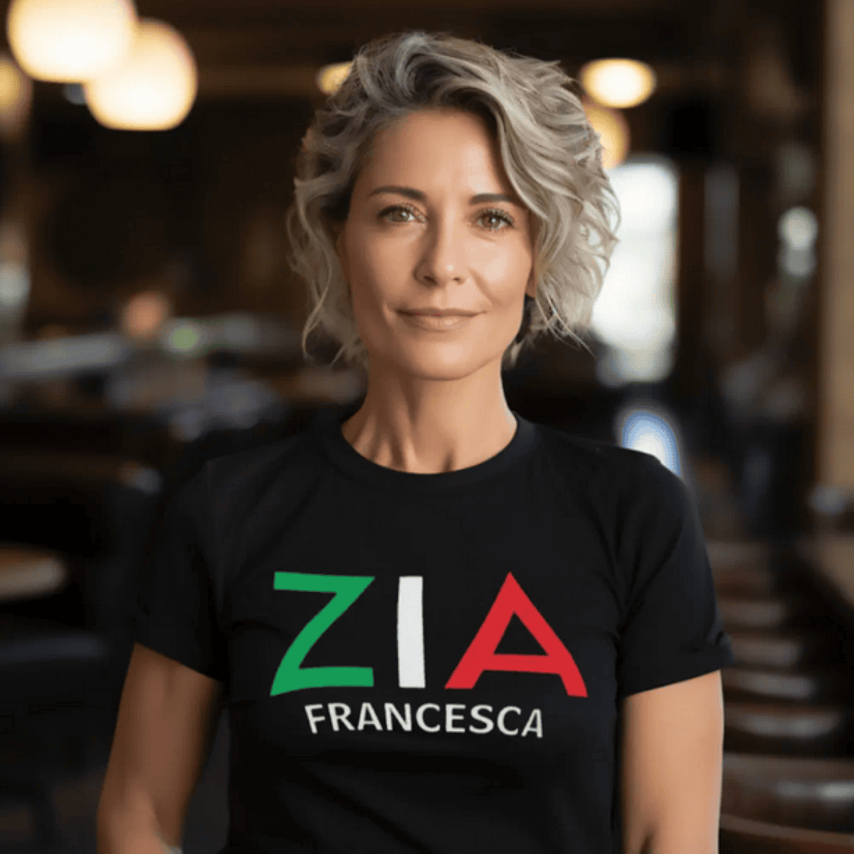 Woman wearing a black t-shirt with 'ZIA FRANCESCA' design Italian Sicilian heritage gift
