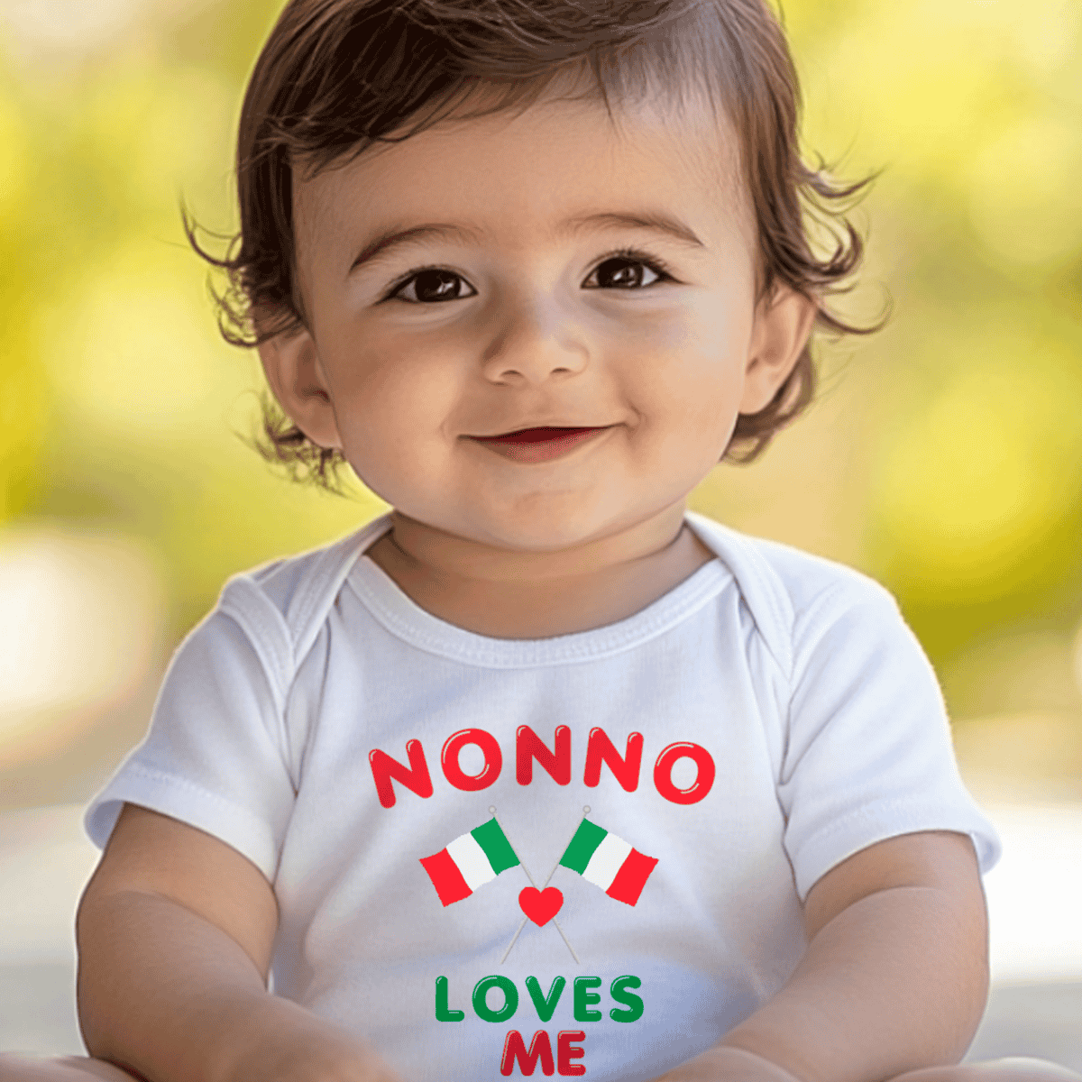 Child wearing a white onesie with 'NONNO LOVES ME' text and Italian flag design.