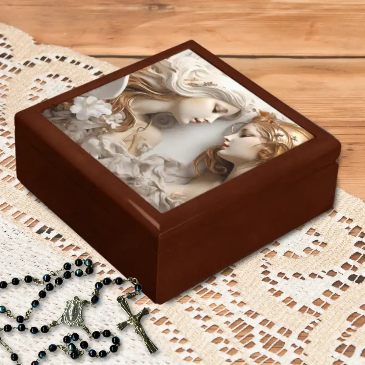 Decorative jewelry box with artistic design on a wooden surface