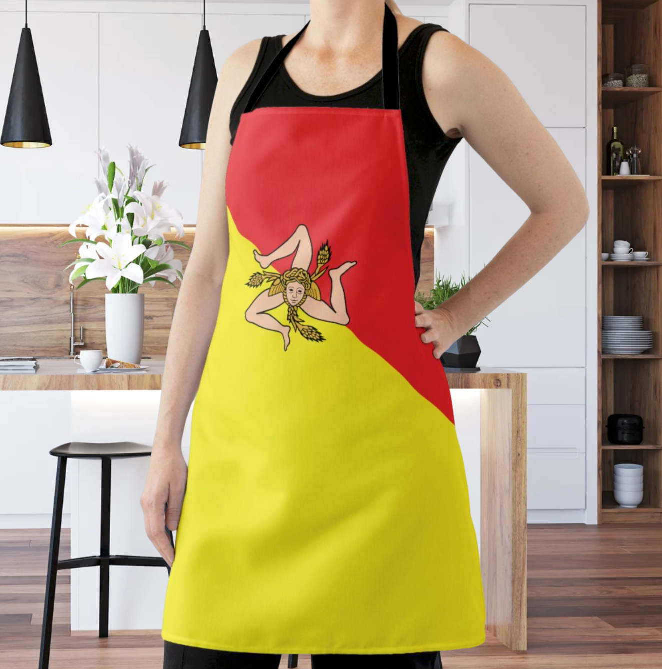Woman wearing an Allover Printed Flag of Sicily Apron. Sicilian Italian heritage gift for her, gift for him, gift for mom, gift for grandmother, gift for dad, gift for nonna, gift for nonno, Christmas gift, Mothers day gift, Father's day gift. Kitchen apron for Sicilian heritage events.