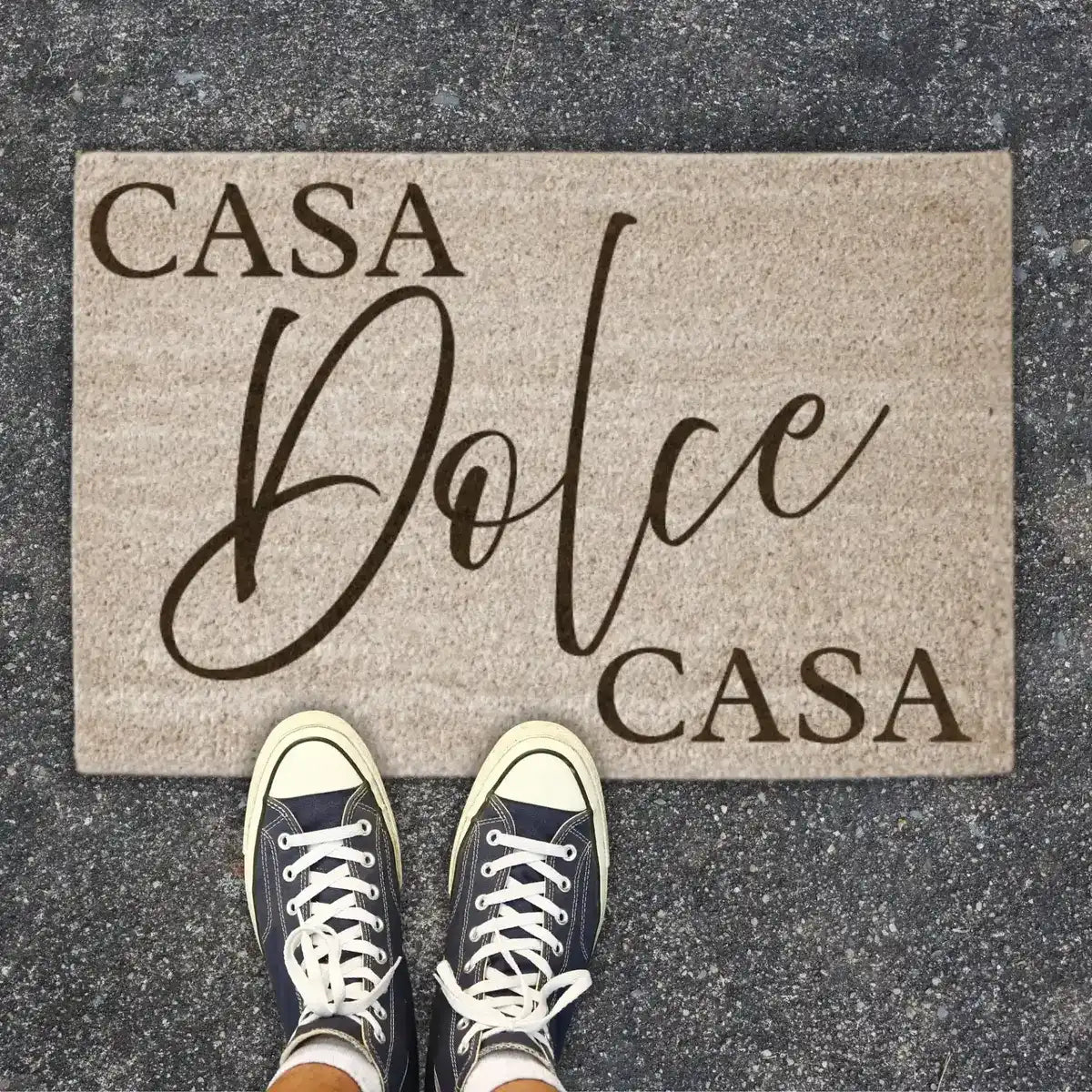 Doormat featuring “Casa Dolce Casa” (“home sweet home”), a welcoming design inspired by Italian heritage. A perfect housewarming, wedding, or bridal shower gift.