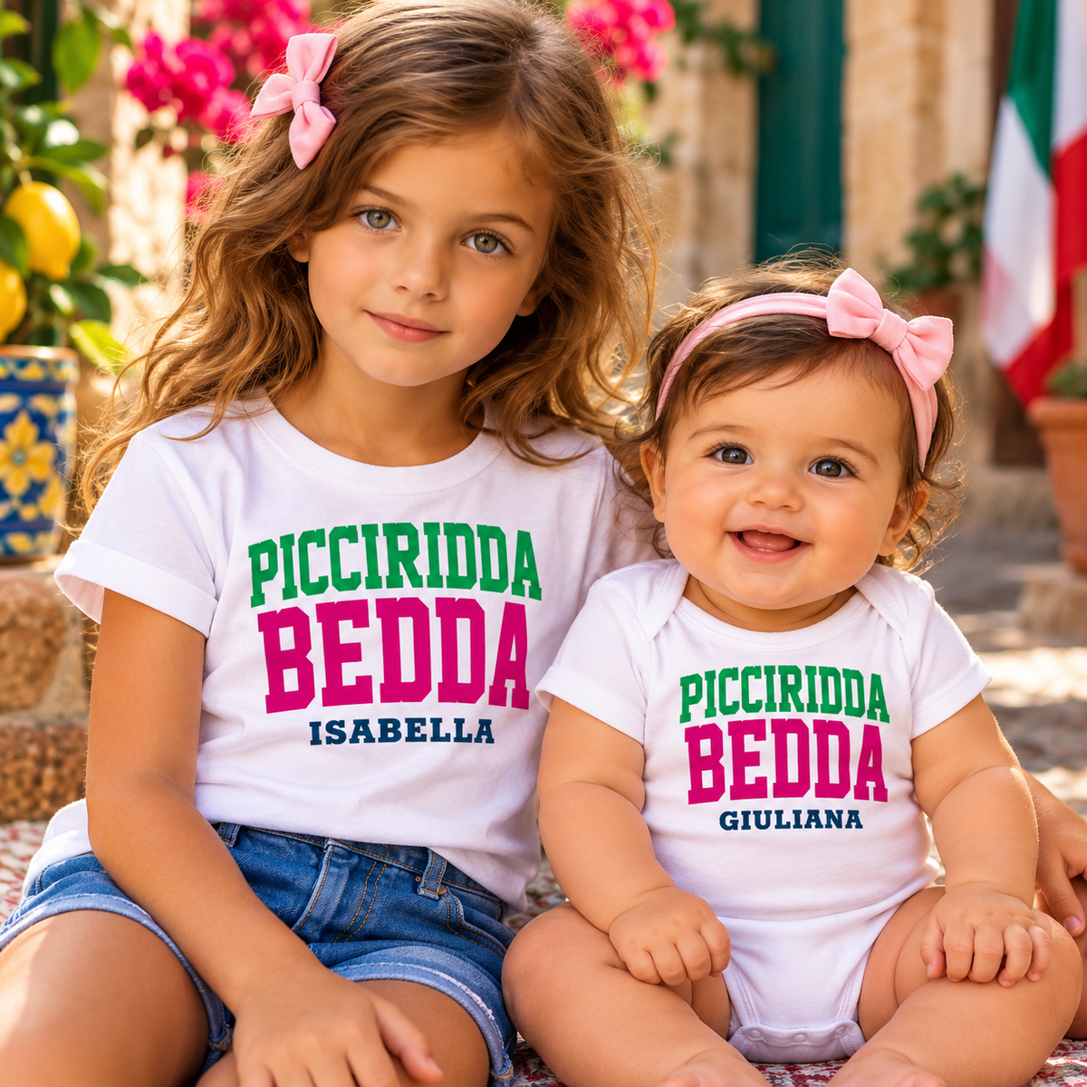 Little girl and baby wearing personalized Sicilian “Picciridda Bedda” tee and onesie, meaning “beautiful little girl,” each with a unique name.