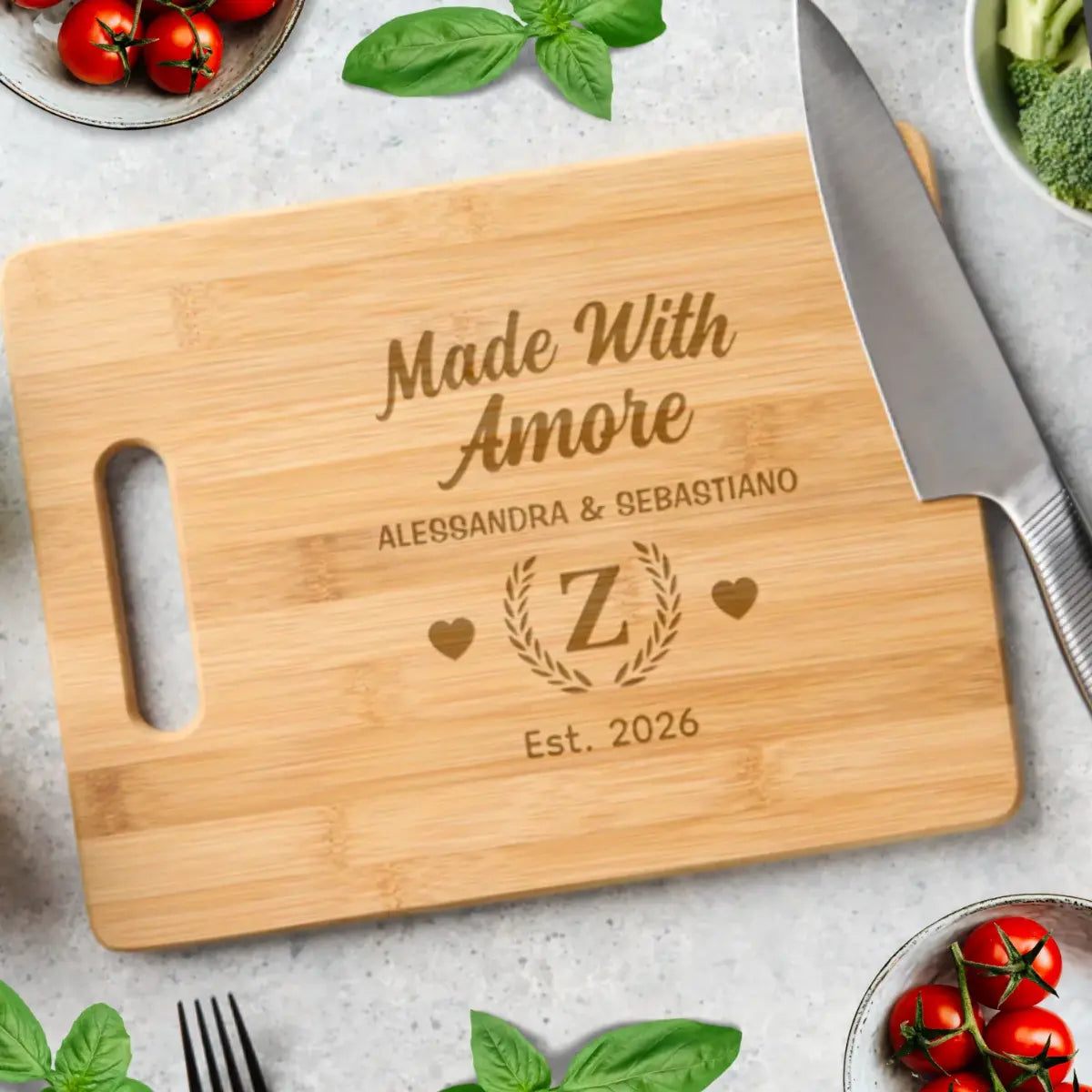 Made with Amore personalized cutting board with custom last inital and est date a lasting Valentine's Day gift for married couples.
