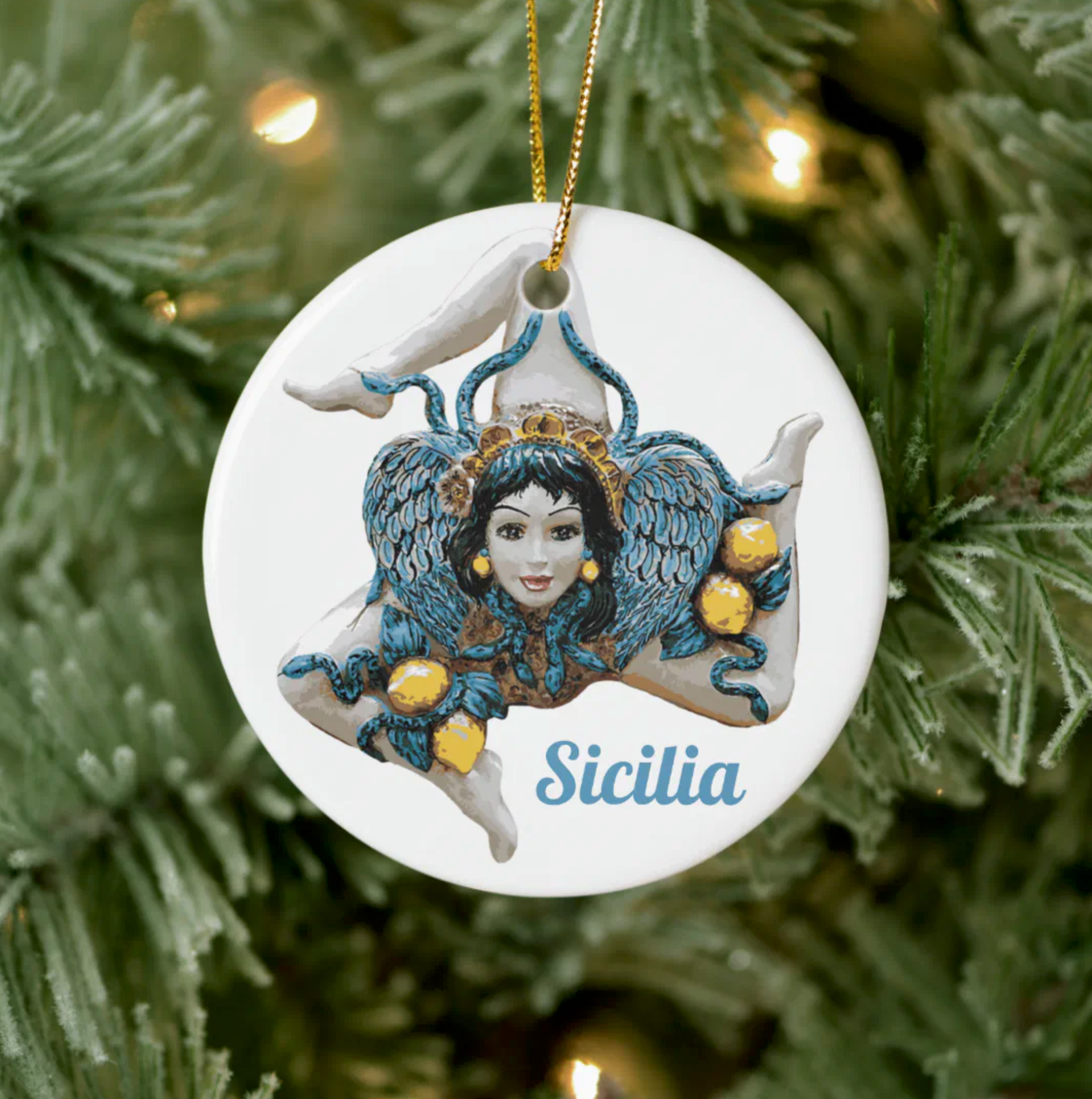 Decorative trianacria ornament with 'Sicilia' on a Christmas tree.