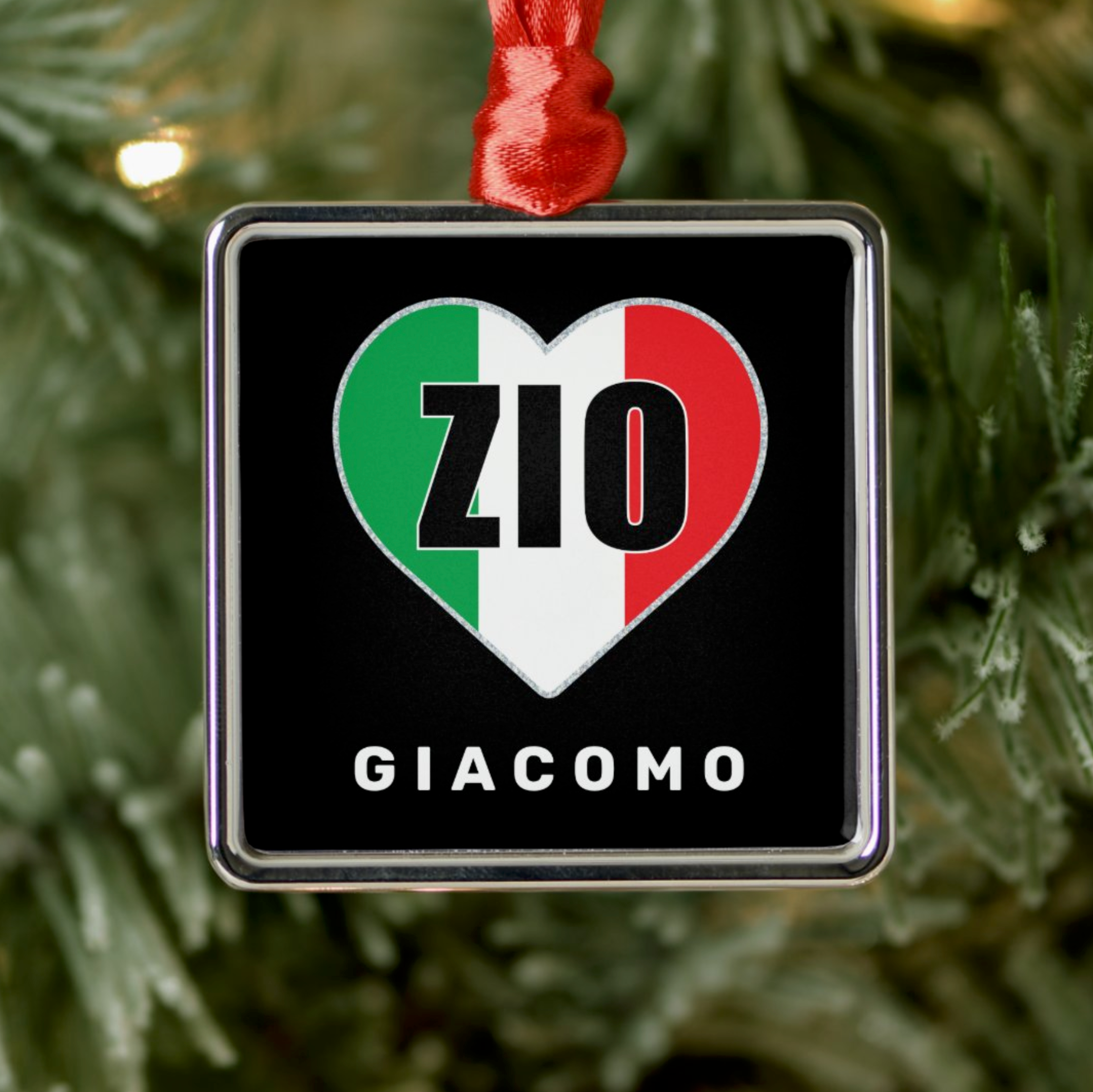 Decorative ornament with heart design and text 'ZIO GIACOMO' personalized on a Christmas tree.