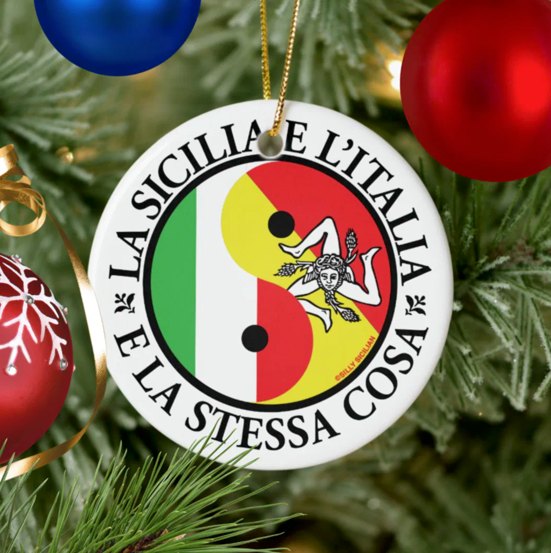 Decorative ornament with Italian Sicilian flag design and text on a Christmas tree.