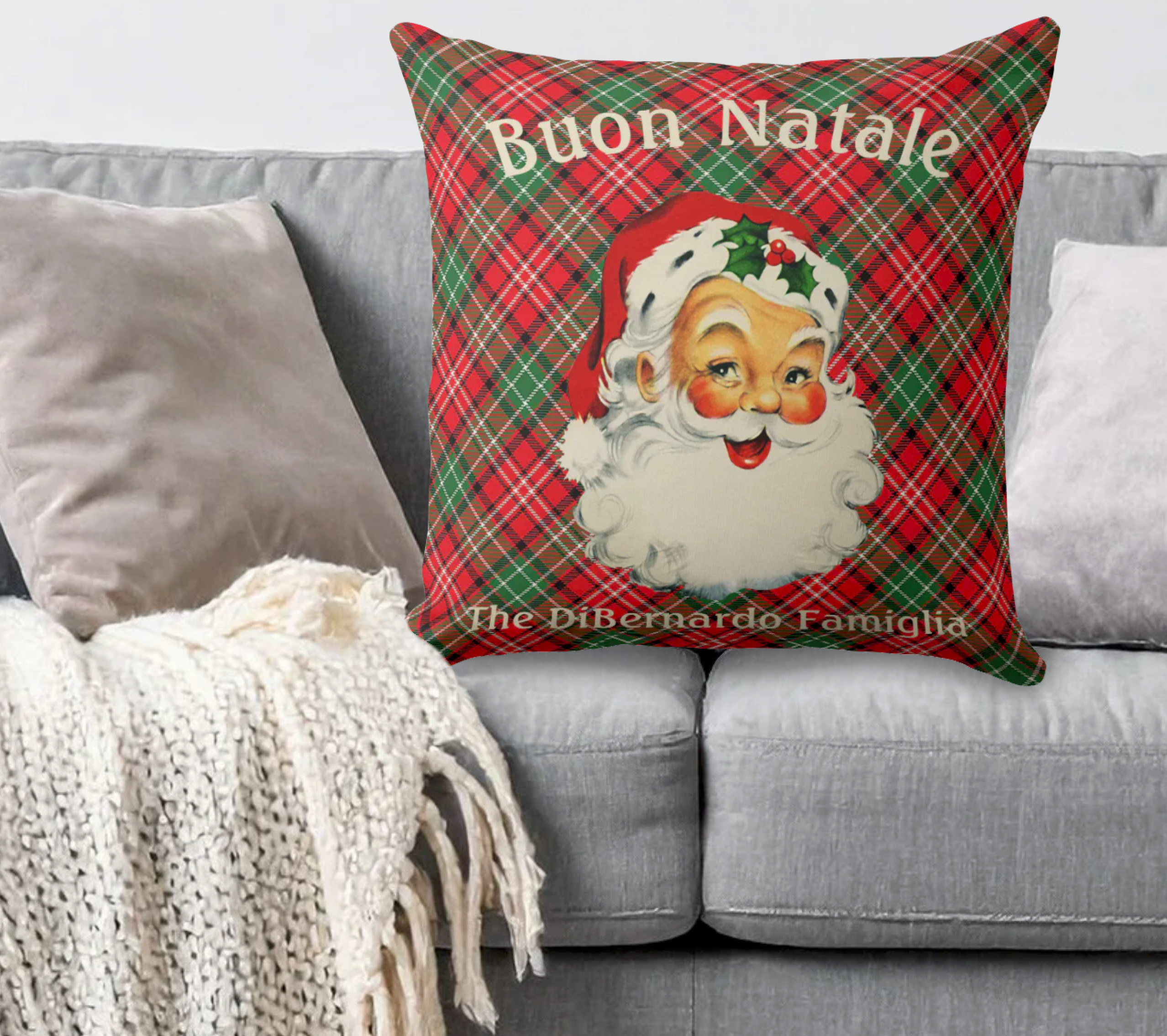 Christmas-themed personalized pillow with Santa Claus on a gray couch