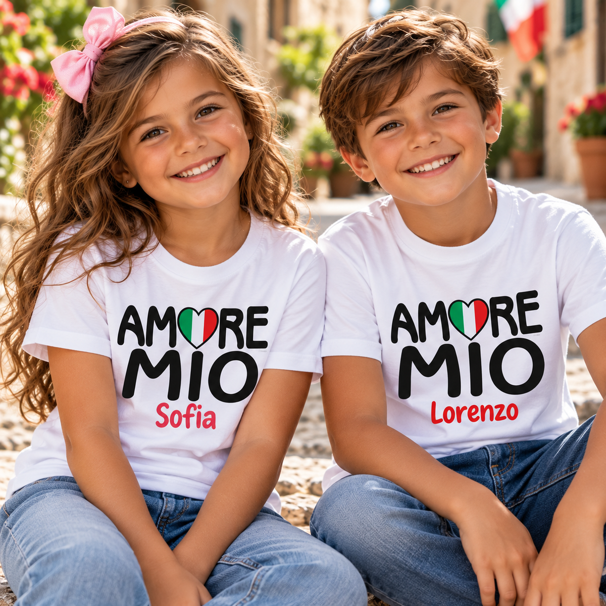 Smiling Italian boy and girl wearing personalized Amore Mio T-shirts with Italian flag hearts and names Sofia and Lorenzo. Matching Italian heritage shirts for kids.