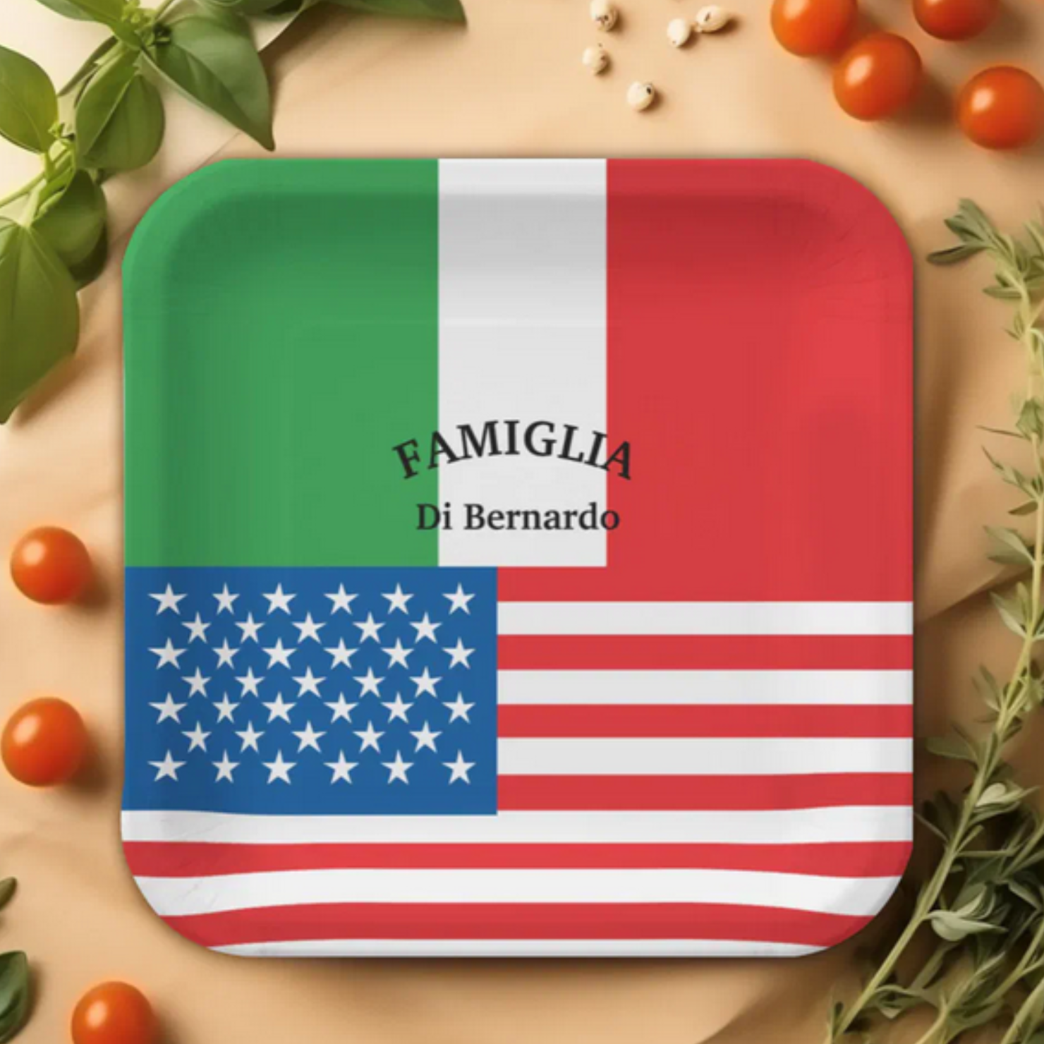 Square plate with Italian and American flag design on a wooden surface with tomatoes and herbs.