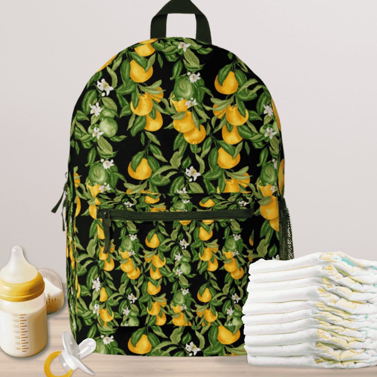 Baby Gear Backpack with lemon pattern on black. Chic mediterranean baby shower gift.