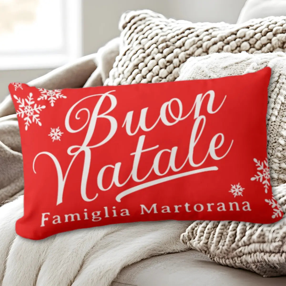 Red pillow with 'Buon Natale' personalized famiglia text on a soft surface