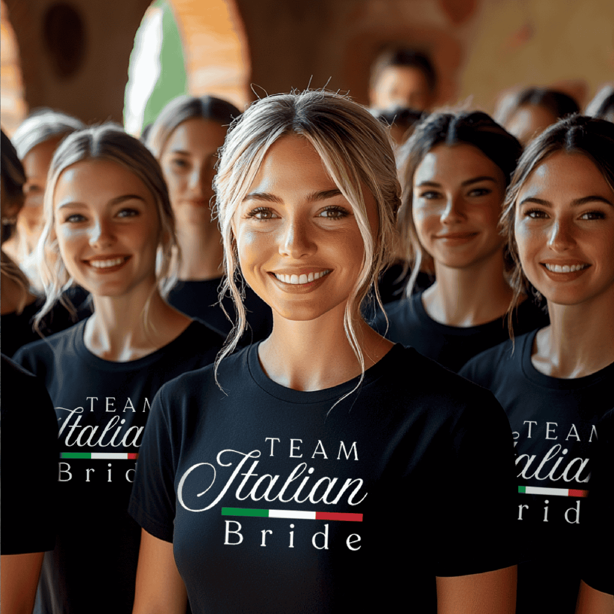 Group of bridesmaids wearing 'Team Italian Bride' shirts in a crowd. From a matching bridal party t-shirt collection for the whole family.